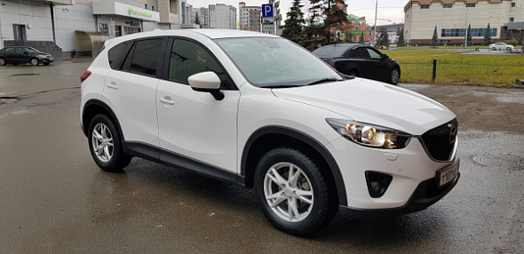   CX-5 2014  1150000 .